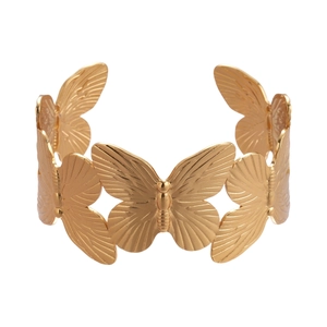 Elegant gold butterfly open cuff bracelet featuring detailed hollow texture and metal finish