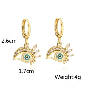 Detailed view of evil eye hoop earrings in gold with dimensions 2.6cm by 1.7cm