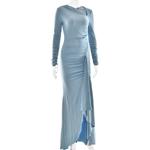 Detail of light blue bodycon dress featuring metallic silk and side ruching texture