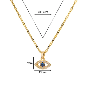 Detail view of 18K gold evil eye necklace with blue zircon and exact size measurements