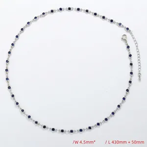 Detail of silver choker with 4.5mm round blue crystals and adjustable chain clasp