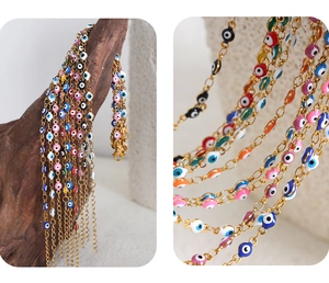 Detailed macro view of colorful evil eye beads on 18k gold plated titanium chain