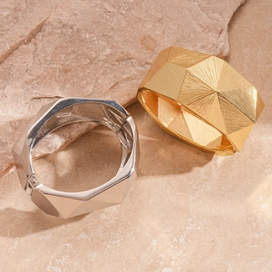 Chic geometric faceted open bangle bracelet in polished gold and silver metal finishes