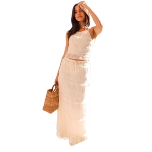 Two-piece white sleeveless crop top and long skirt summer set for beach vacation