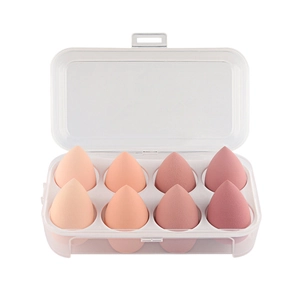 8-piece makeup sponge set in gradient pink tones with a clear storage case