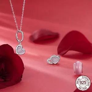 925 sterling silver heart bead charms and pink opal stone set on red rose petals