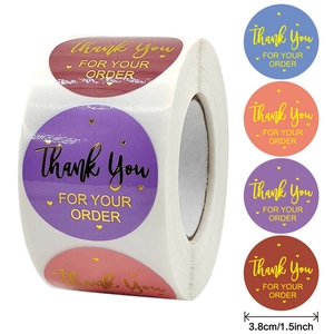 Detailed view of round pink and colorful Thank You stickers with dimensions 3.8cm
