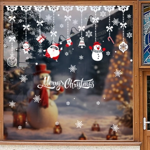 Christmas window decals with Santa Claus, snowmen and Merry Christmas text on glass