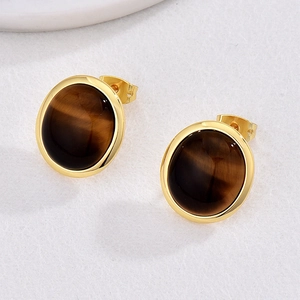Vintage round brown tiger eye stud earrings with polished gold plated metal finish