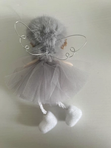 Detail view of the silver glitter wings and grey tulle tutu on the angel ornament