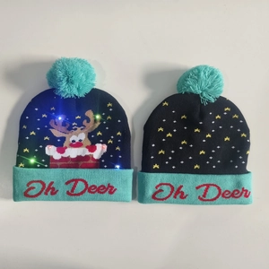 Detail of Christmas knit hat with colorful LED lights and Oh Deer reindeer pattern