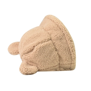 Detail of soft sherpa fleece bucket hat with cute bear ears in beige color
