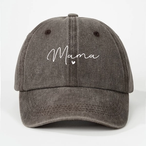 Detail of MAMA script and heart embroidery on washed cotton dark grey baseball cap