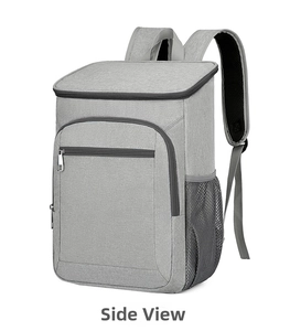Macro view of gray insulated picnic backpack featuring breathable mesh shoulder straps