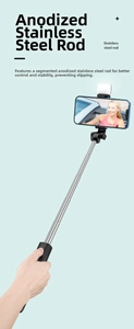 Detail of telescopic selfie stick with stainless steel rod and integrated LED fill light
