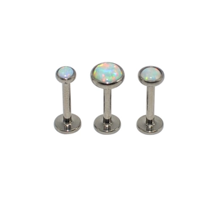 Three-piece set of G23 titanium labret studs with iridescent white opal inlay on white