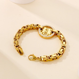 Gold stainless steel thick chain bracelet with boy and girl pendant and cubic zirconia