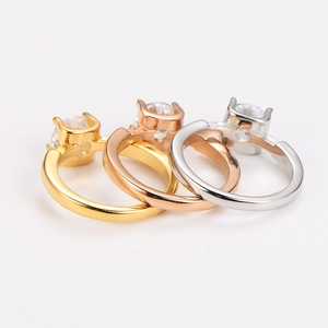 Three-piece stackable stainless steel rings set in gold, rose gold and silver with zircon