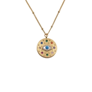 Gold evil eye necklace with blue center and colorful zircons on a delicate chain
