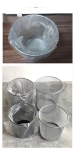 Three sizes of round metal mesh waste bins in silver and black metal finishes