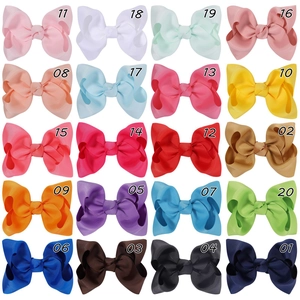 Detailed grid showing 20 colorful grosgrain ribbon hair bows with identification numbers