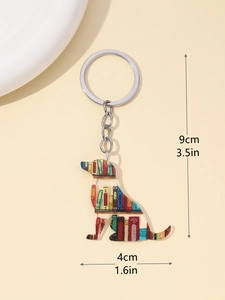 Acrylic dog keychain with bookshelf pattern and dimensions 9cm by 4cm for school bags