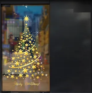 Detail of golden spiral star Christmas tree window decal with Merry Christmas text