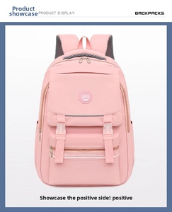 Detailed front view of pink waterproof backpack showing zipper pockets and adjustable straps