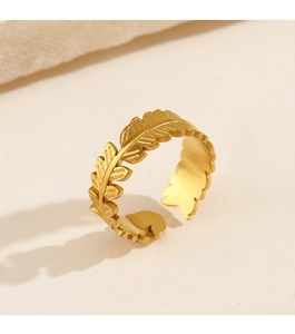 Macro detail of 18K gold plated leaf ring with hollow olive branch texture design