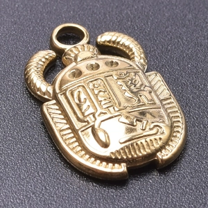 Golden 304 stainless steel beetle pendant with detailed Egyptian hieroglyphic carvings