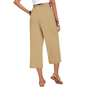 Detail view of khaki high-waisted linen pants back profile with elastic waistband