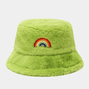 Close-up of vibrant rainbow embroidery on a fuzzy neon green plush bucket hat