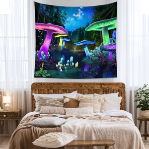 Detail of mushroom tapestry on bedroom wall with warm lighting and a cozy home atmosphere