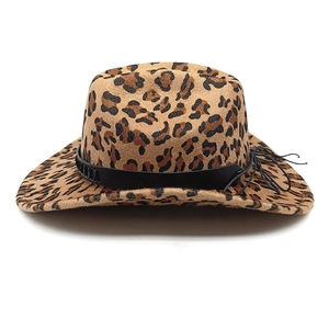 Close-up of leopard print cowboy hat with black leather band and side string detail