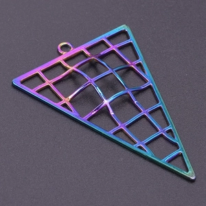 Macro detail of rainbow triangle mesh pendant with connection ring in 18k gold plating