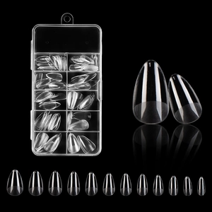 Detailed set of transparent almond false nails in plastic box with 0-9 size labels