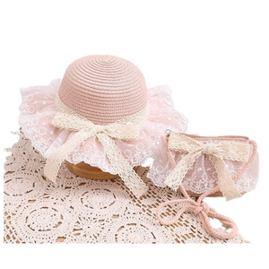 Pink girls straw hat and mini crossbody bag set with lace ruffles and sweet bows