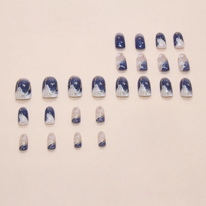 Unghie finte blu marmorizzate con stelle dorate e glitter in set da 24 pezzi