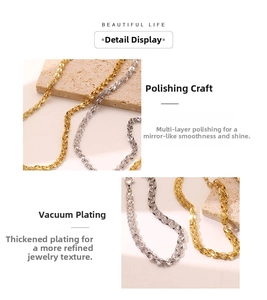 Close-up of polished vacuum-plated metal chain links in gold and silver finishes
