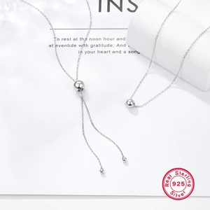Minimalist S925 sterling silver Y-shaped bead tassel necklace on white background