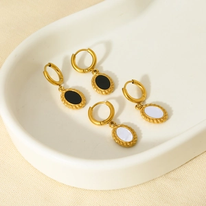 18K gold plated stainless steel hoop earrings with black and white resin oval pendants