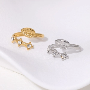 Leaf design adjustable open rings in gold and silver finish with sparkling zircon accents