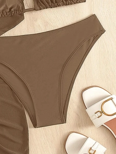 Detailed flat lay of dark brown high-stretch bikini bottoms with professional stitching
