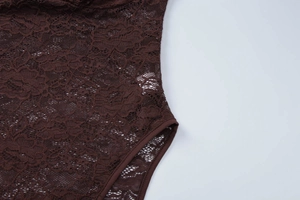 Close-up detail of fine floral lace texture on the coffee brown bodysuit set