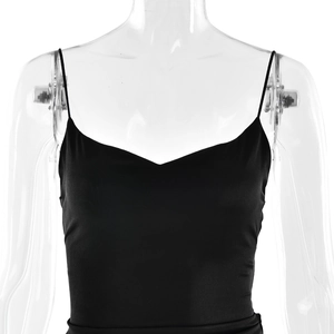 Detail of elegant black satin evening dress showing the slim straps and V-neckline