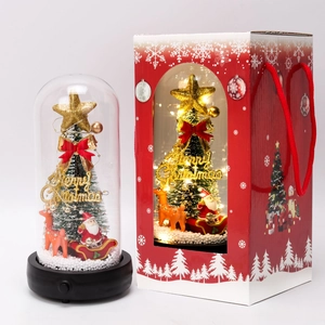Glow Christmas glass dome with reindeer tree and red gift box packaging detail