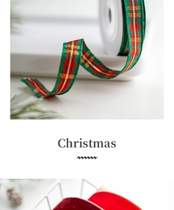 Close-up of green, red and gold plaid Christmas ribbons with pine cones and needles decor