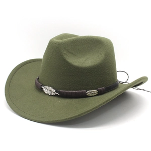 Detail of olive green fedora hat featuring brown leather band and metal leaf ornaments