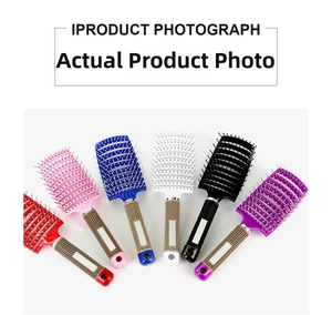 Curved vented hairbrushes in six vibrant colors with anti-slip grip handles for styling