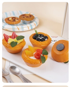 Detailed view of artificial fruit tart magnets with realistic crust texture and strong magnet